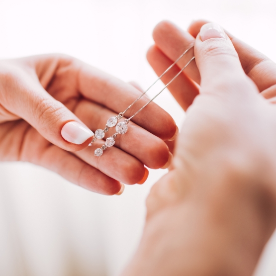 Hand Holding Necklace